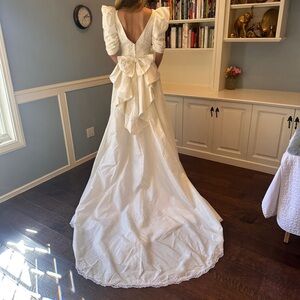 Vintage wedding dress with long train